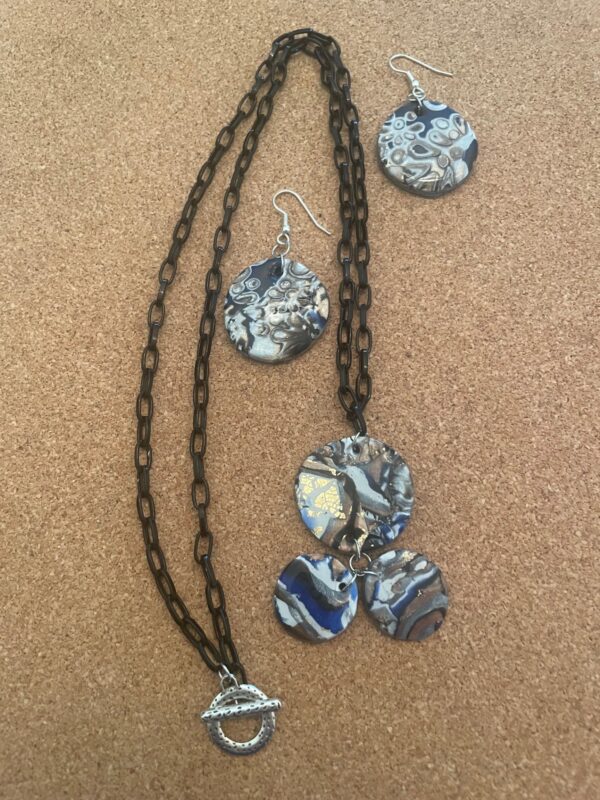 Polymerb Clay-Mokume gani Jewelry made by students with instructor Desiree Luvaul